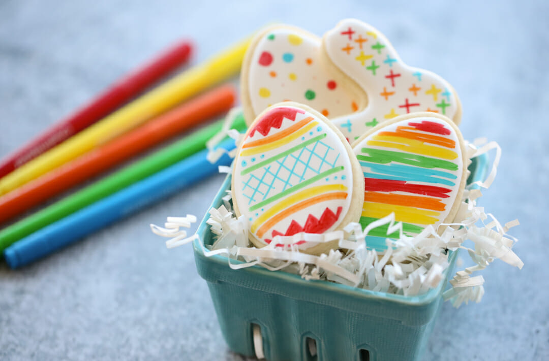 rainbow easter cookies in basket