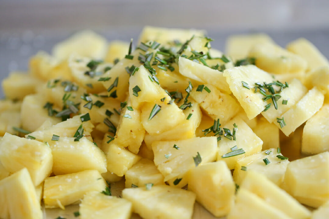 fresh pineapple chunks with rosemary