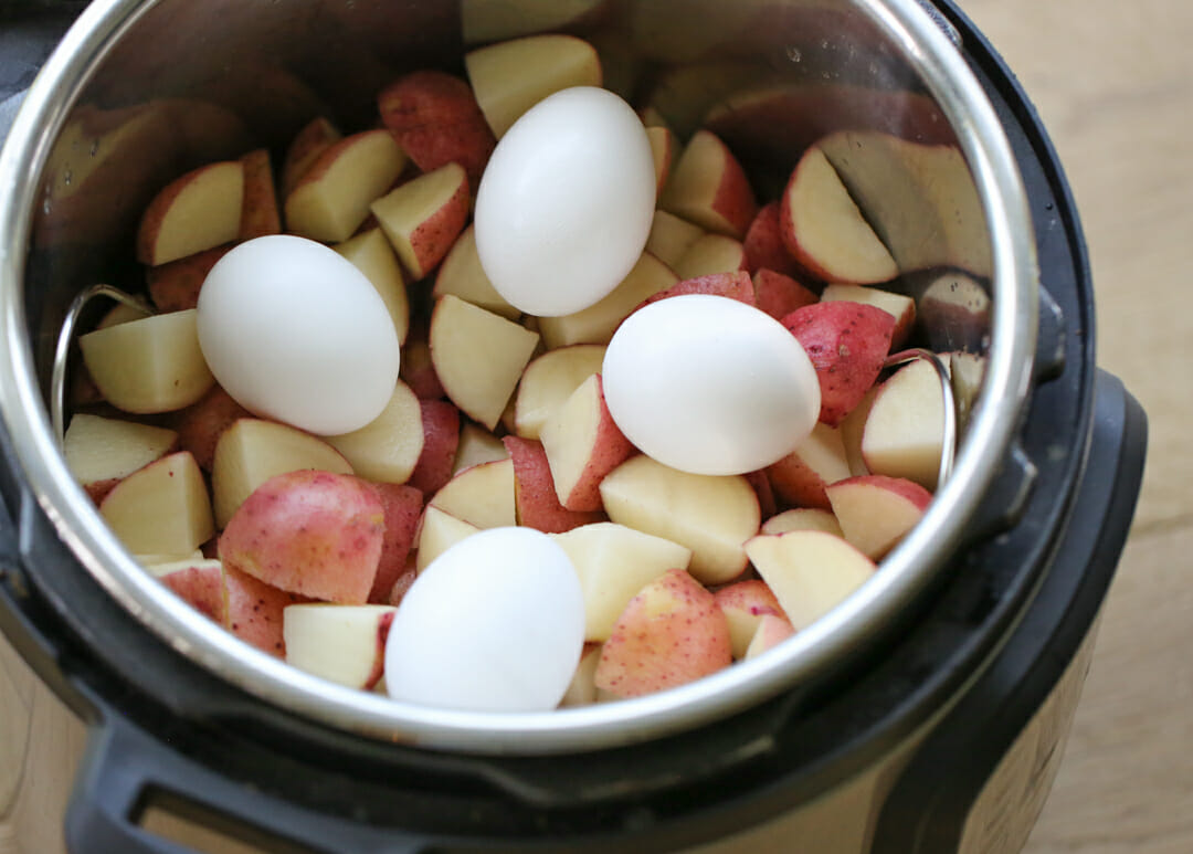 Potatoes and eggs in pressure cooker