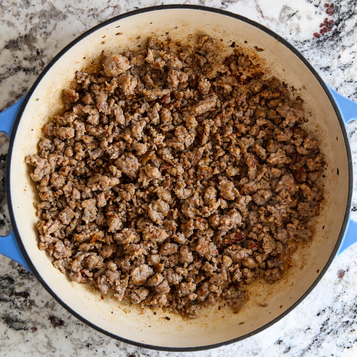 browned sausage in a pan