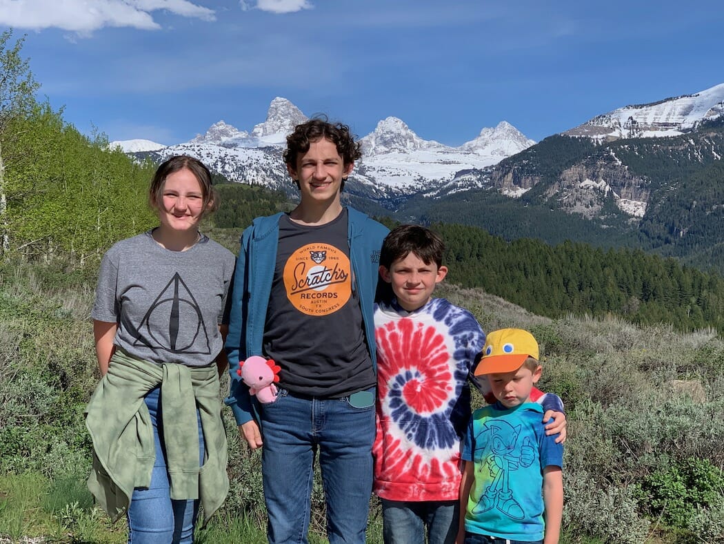 Kids in front of the Grand Teton Mountain Range