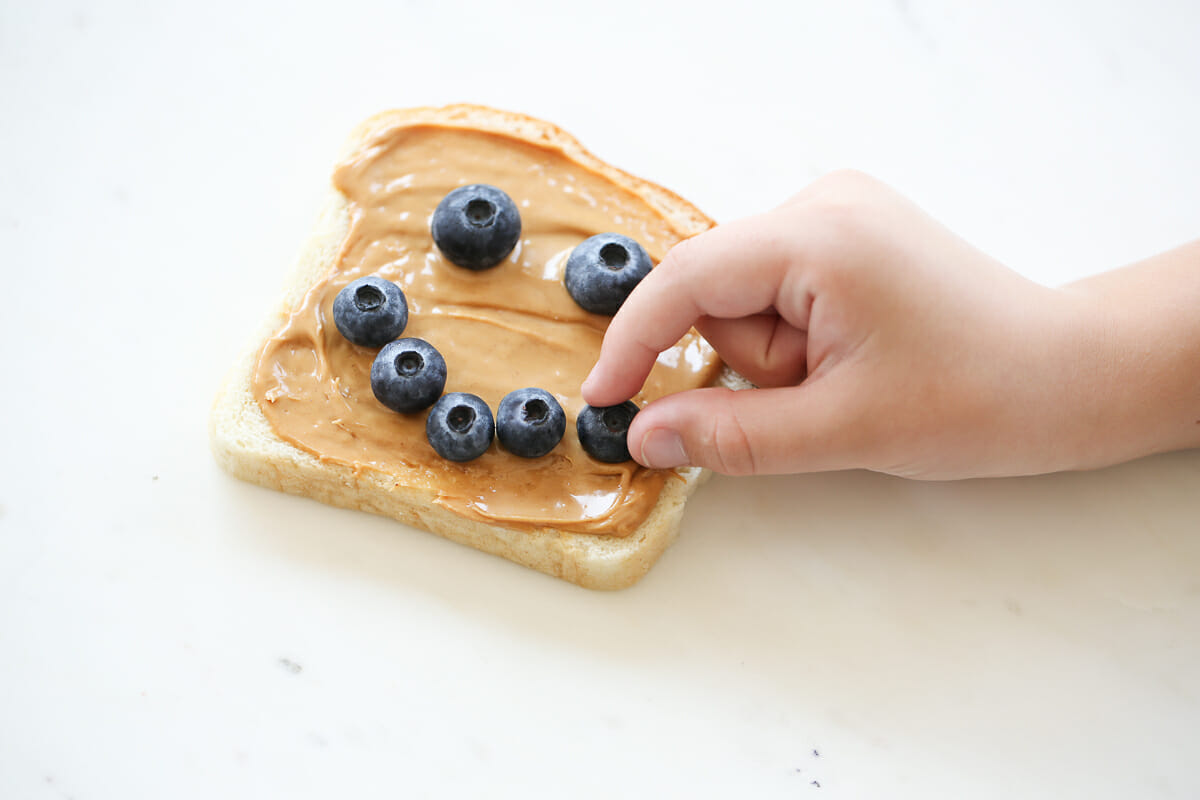 peanut butter toast with blueberries