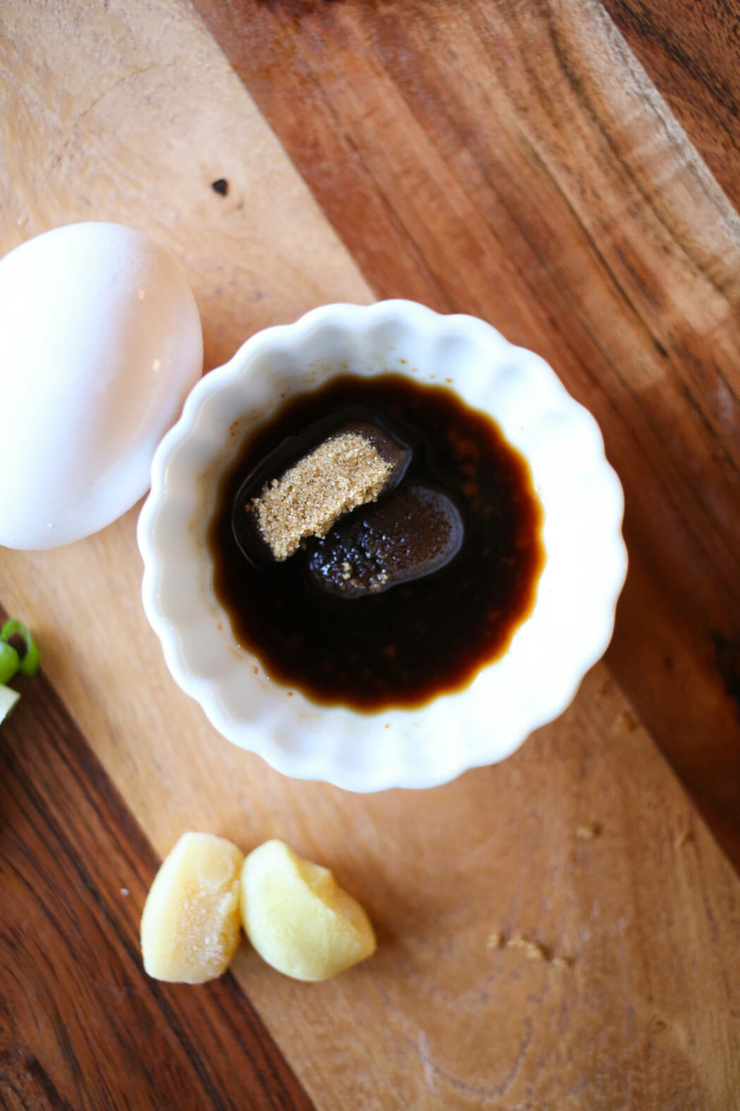 soy sauce and brown sugar in a small white bowl