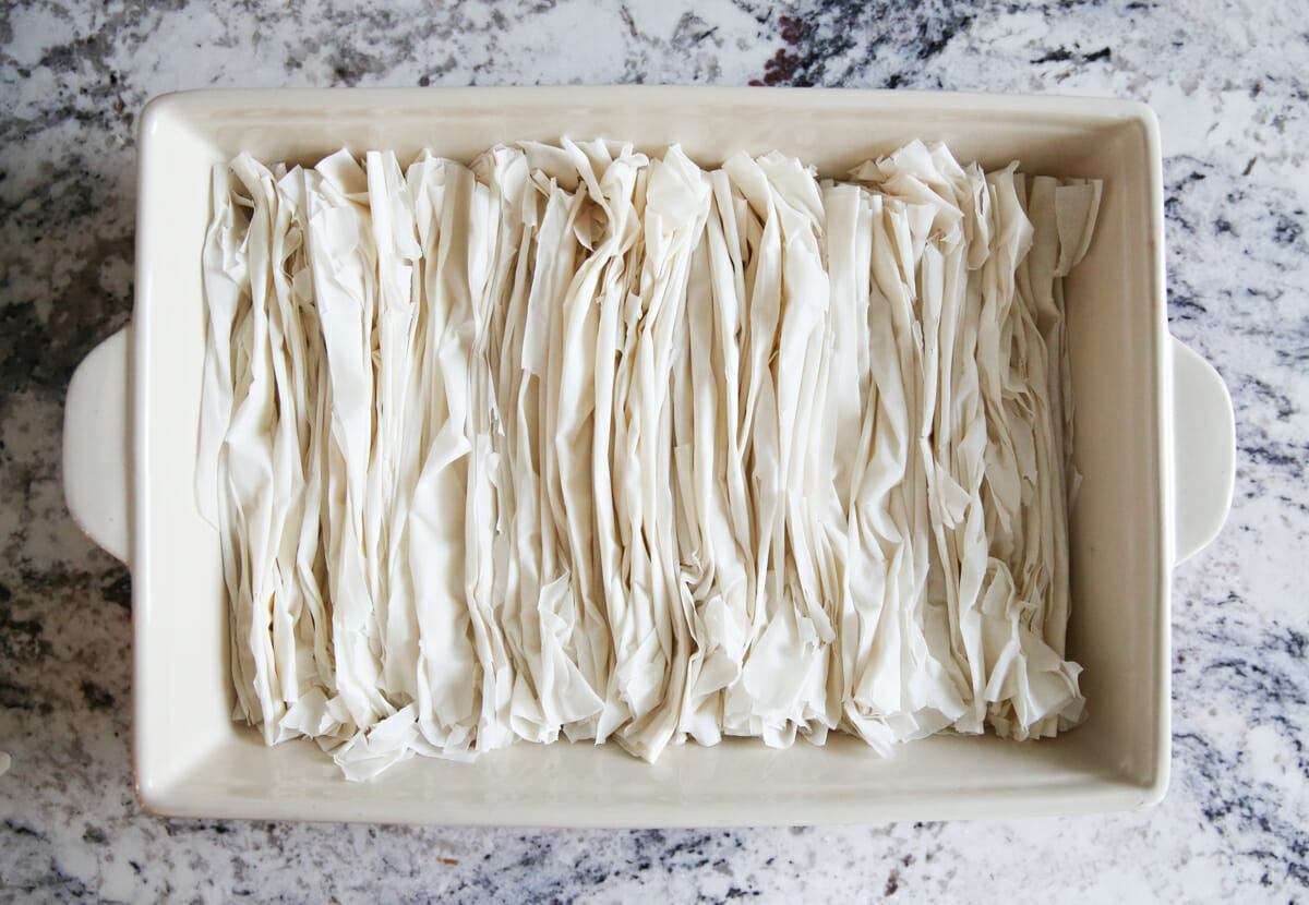 Phyllo Dough stacked in baking pan