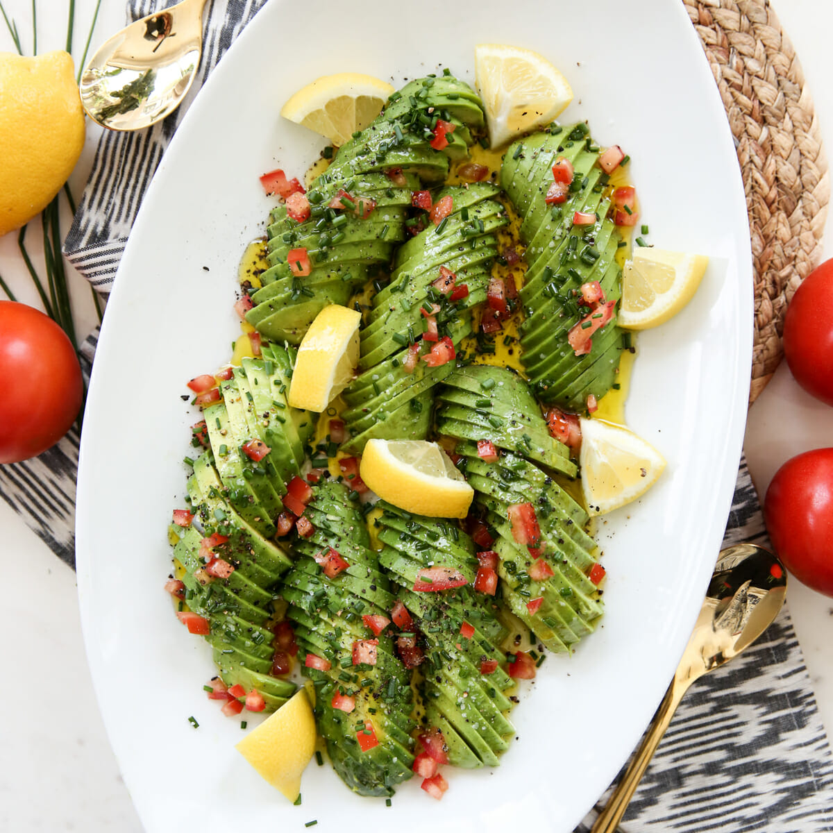 sliced avocados with olive oil and lemon