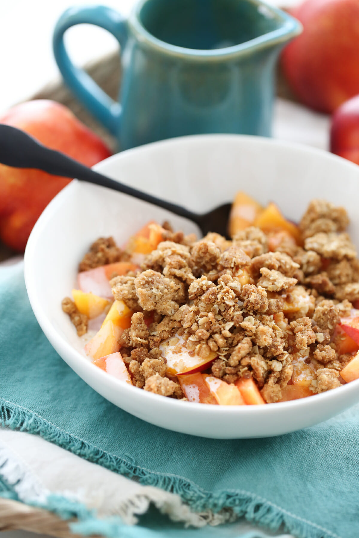 crumb topping over peaches and cream