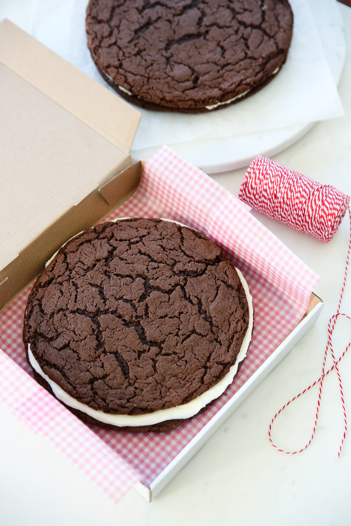 Giant homemade oreo in pizza box