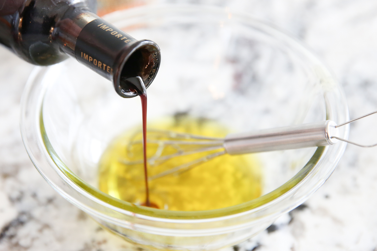balsamic vinegar pouring into olive oil
