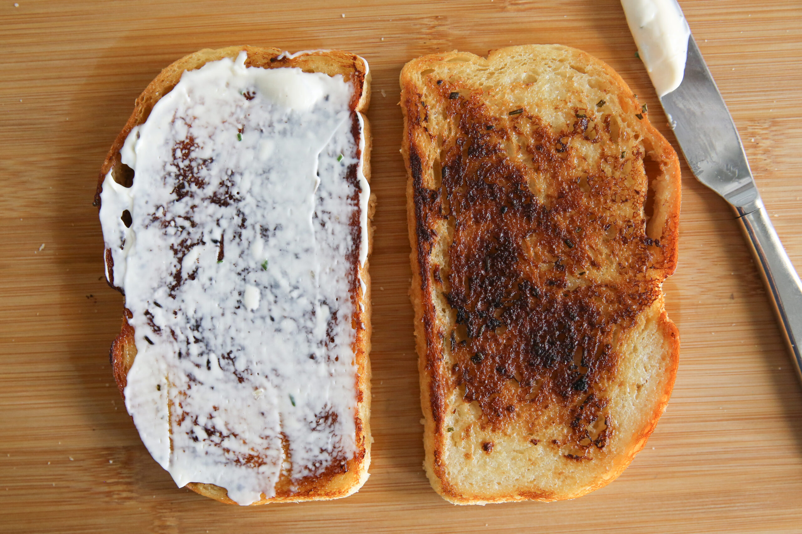 toasted bread spread with mayo