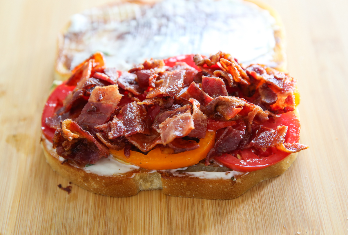chopped bacon on sandwich