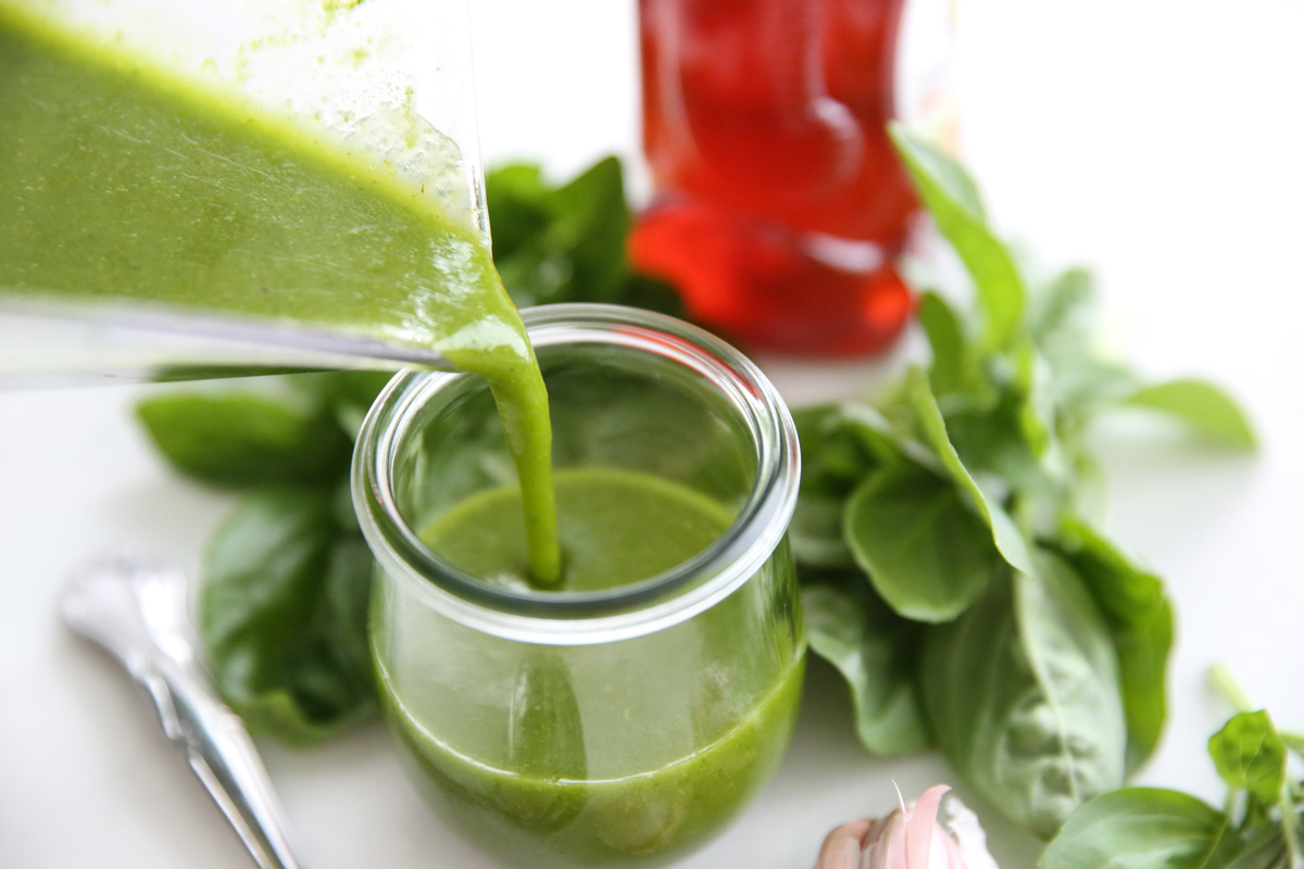 Basil Vinaigrette Dressing poured into a jar