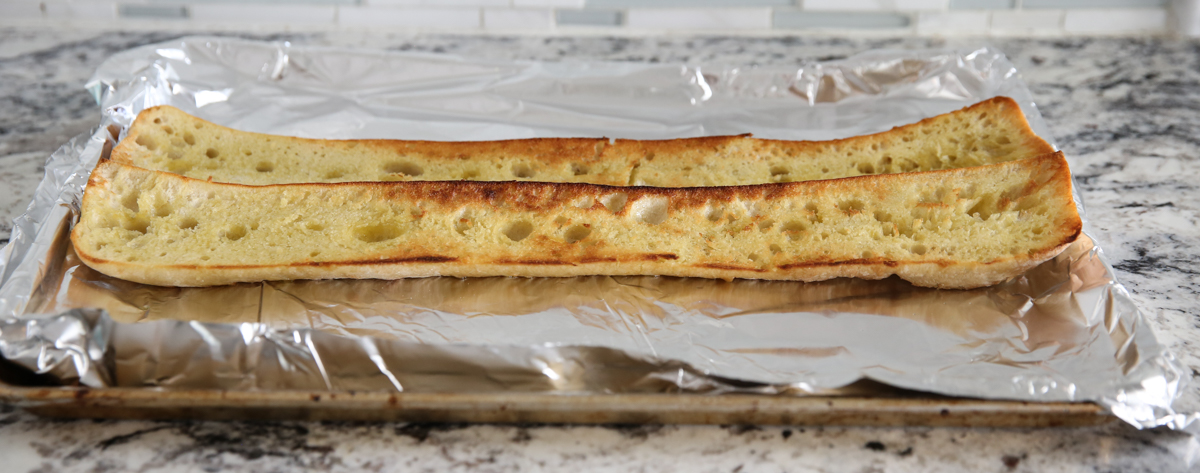 Toasted baguette on a pan