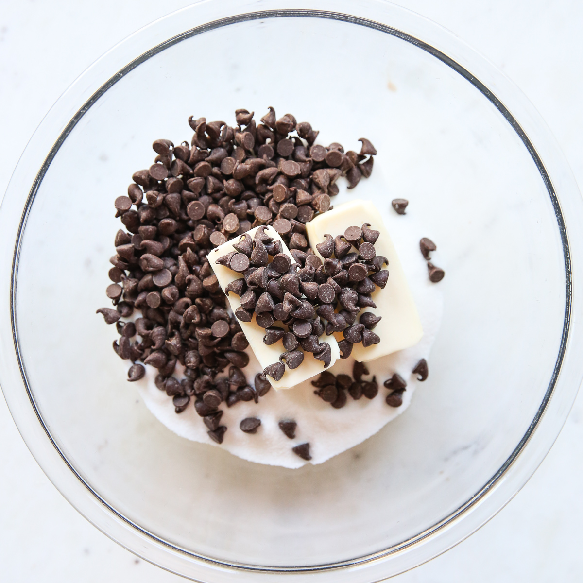 cutter and chocolate in a glass bowl
