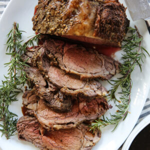 sliced rib roast on a platter