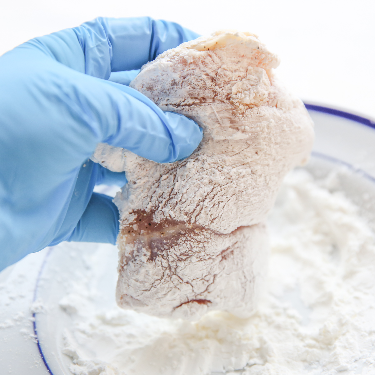 dredging chicken thighs in cornstarch