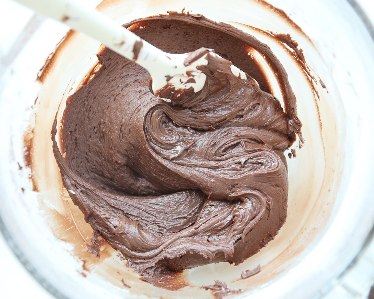 chocolate frosting in a mixing bowl
