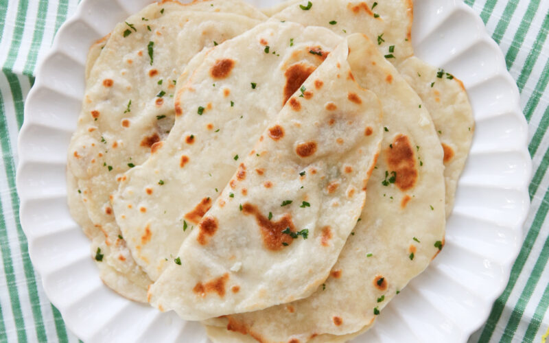 folded flatbreads on a plate