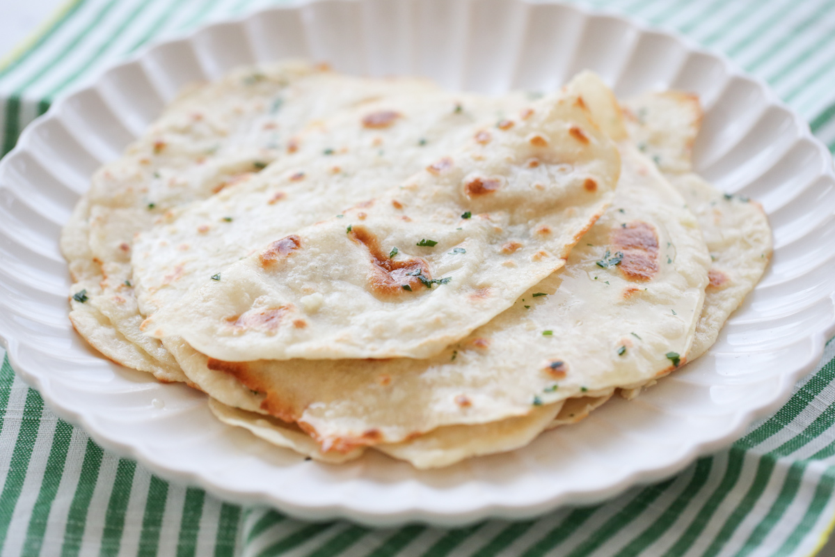 folded flatbreads on a plate