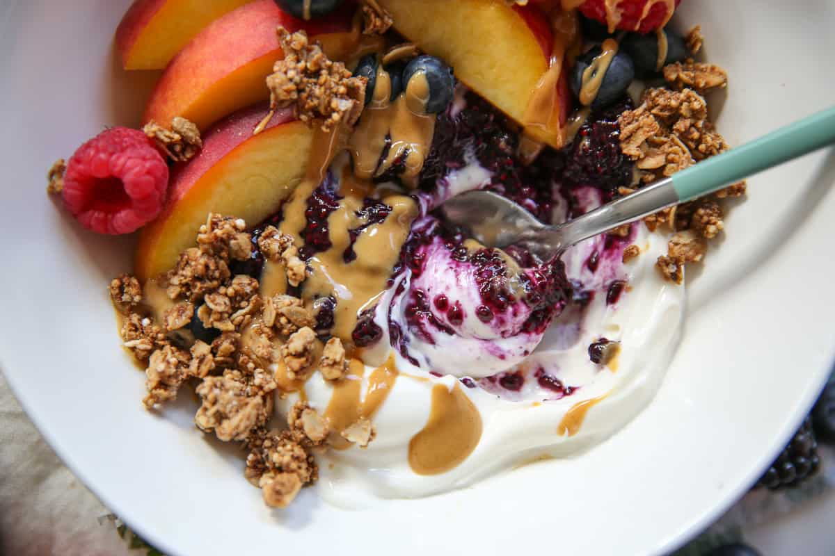 Healthy chia seed jam with fresh fruit and yogurt in a bowl.